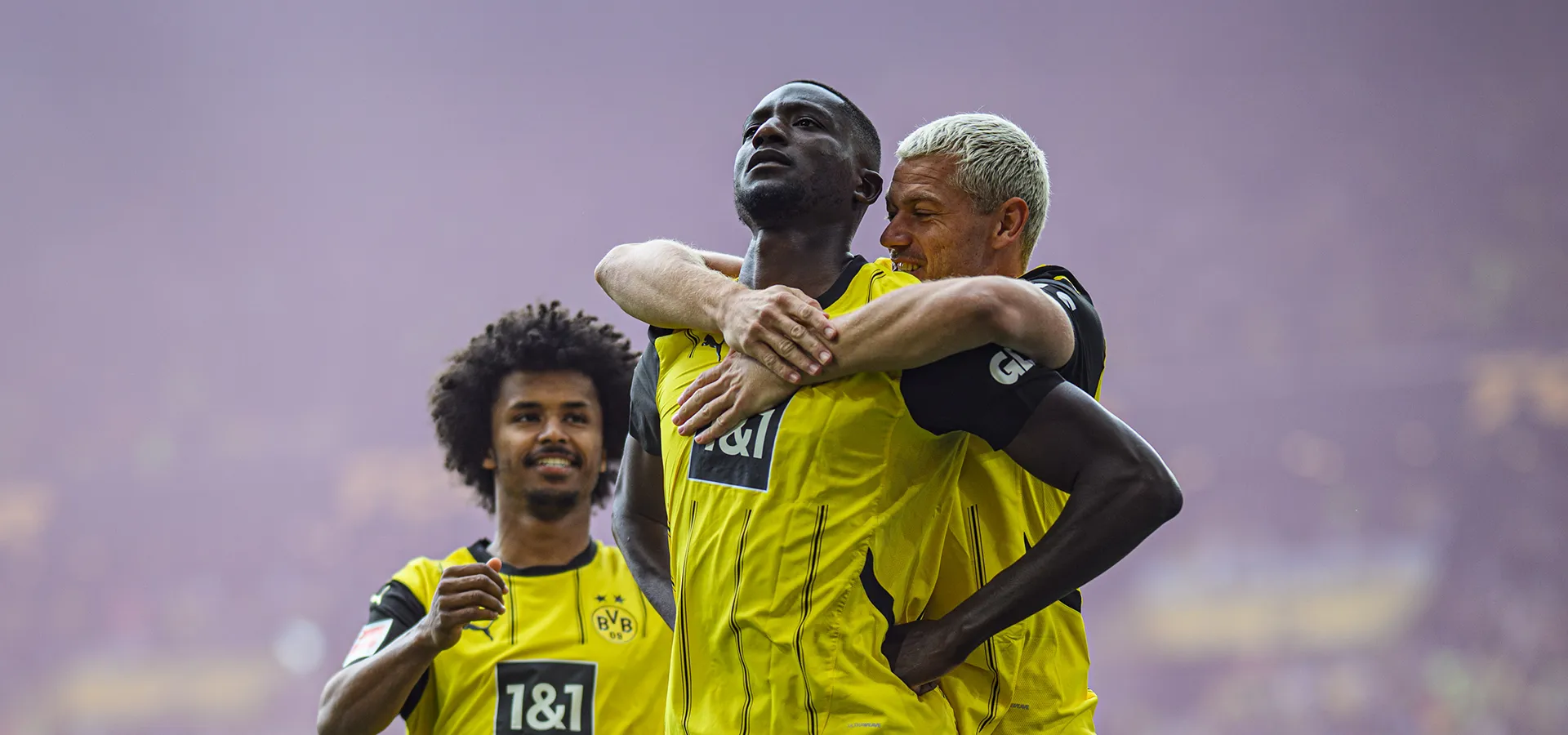 Serhou Guirassy celebrates with his BVB teammates Karim Adeyemi and Julian Ryerson. (Photo)